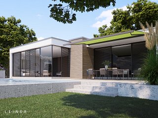 Grüne Kassettenmarkise von Leiner auf einer Terrasse