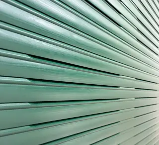 Grüner Rollladen, umgesetzt von der Schuhbauer junior GmbH